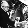  	Faculty composer Merrill Ellis at the Moog synthesizer in the North Texas Electronic Music Composition Laboratory (c.1967). 