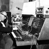 Faculty composer Merrill Ellis at the Moog synthesizer in the North Texas Electronic Music Composition Laboratory (c.1967). 